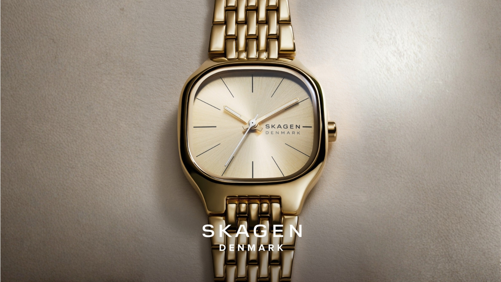 Skagen zlatni sat sa tankim kućištem, čistim brojčanikom i metalnom narukvicom u duhu danskog minimalističkog dizajna